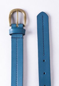 Leather belt in blue with a brass buckle. Features include a smooth finish, pointed tip, and stitching along the edges with five holes for adjustment.
