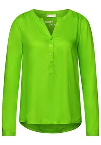 Langärmliges, leuchtend grünes Hemd aus glattem Stoff; mit V-Ausschnitt und fünf Knöpfen vorne sowie gerafften Schulterdetails.