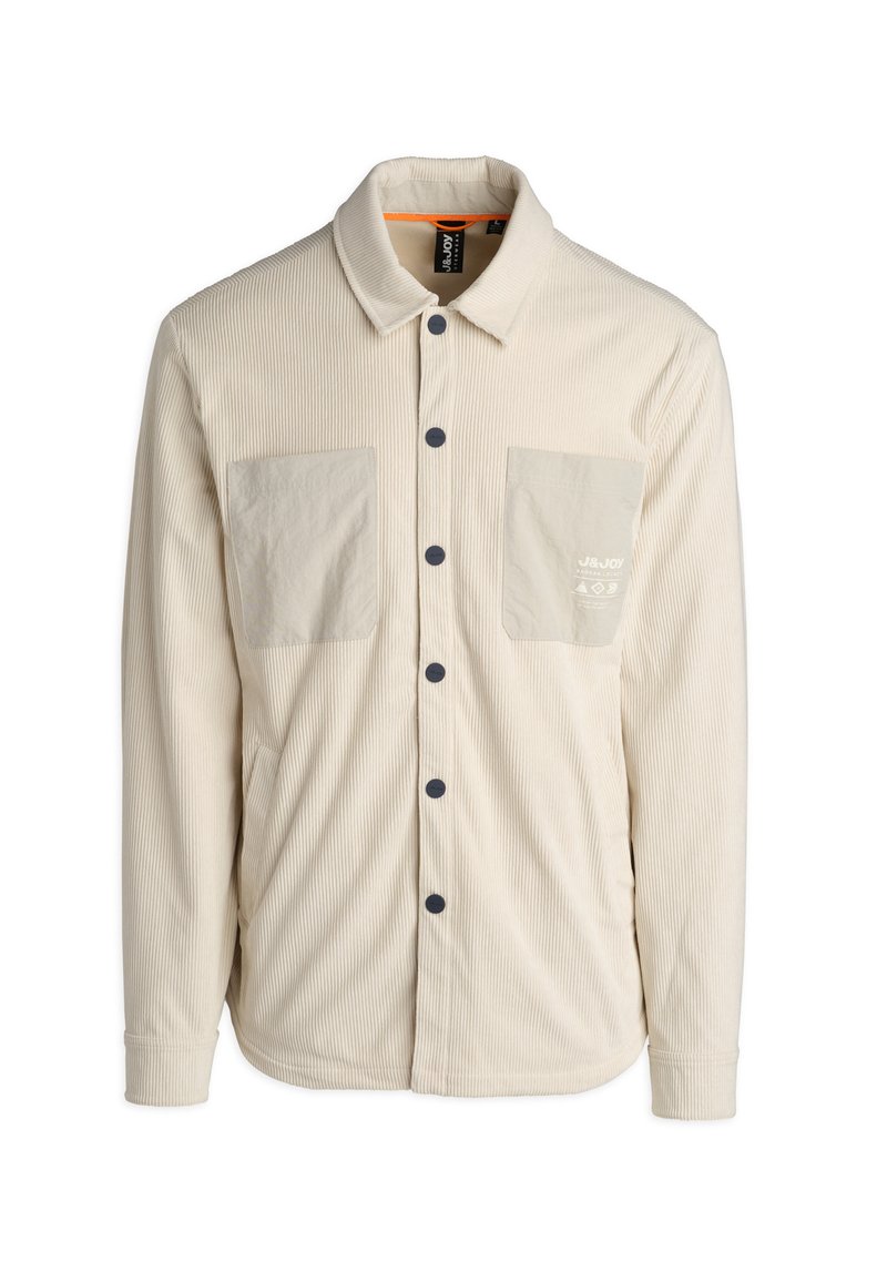 Beige corduroy shirt met een verhoogde textuur, twee opgestikte zakken, zwarte knopen en een oranje accent aan de binnenkant van de kraag.