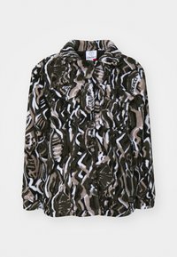 Fluffy, lange mouwen jas in bruin, zwart en wit, met een abstract tribalpatroon, kraag en zijzakken. Zacht fleece-materiaal.