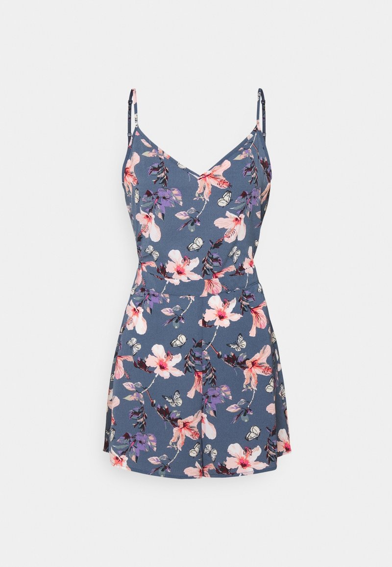 Rompers à motif floral bleu avec des bretelles spaghetti, présentant des fleurs roses et violettes, et un design de jupe courte et fluide.