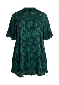 Blúzka z kvetinovej čipky v smaragdovo zelenej farbe s krátkymi rukávmi, zapínaním na gombíky vpredu a voľným strihom. Priesvitná textúra s vystúpenými kvetinovými vzormi.