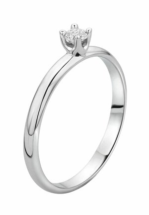 Silberring mit einem glatten, polierten Band und einem runden Diamanten, der in einer Krone mit sechs Zinken gefasst ist. Schlichtes und elegantes Design.