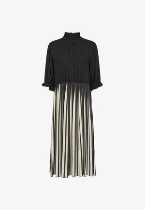 Crna i krem haljina s ruffles ovratnikom, kopčanjem na dugmad i kratkim rukavima; ima vertikalne pruge na plisiranoj suknji.