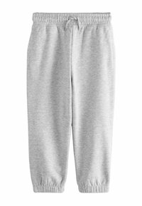 Grå sweatpants i mjukt material. Har resårmidja med snörning, smalnande ben och manschetter vid anklarna. Minimalistisk design.