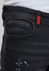 EMILIO - Blugi slim fit - black