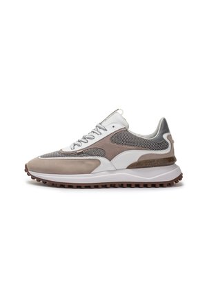 Sneakers featuring a combination of white breathable mesh and taupe suede, with a textured brown rubber sole and grey accents. Laces featured.