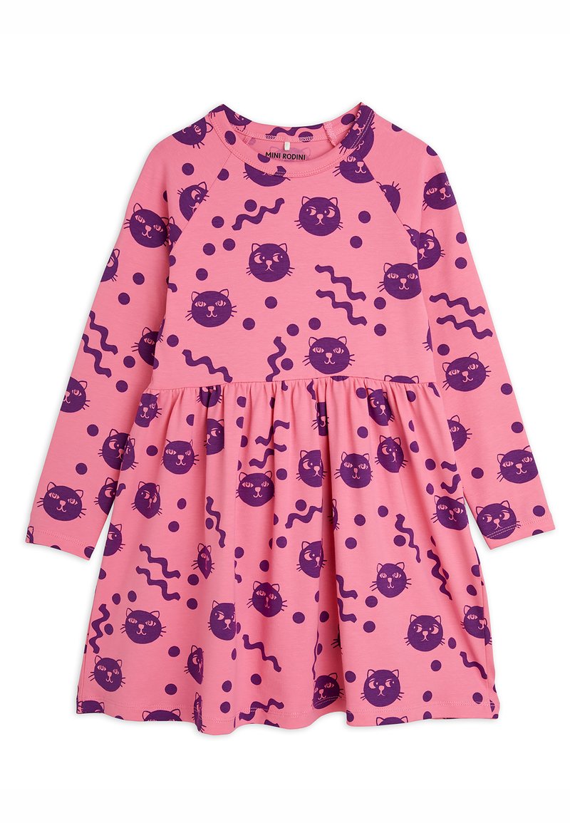 Pink long-sleeve dress with a flared skirt, featuring a playful pattern of purple cat faces and wavy lines, made from soft cotton material.