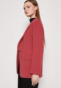 BOSS JOCALUAH - Puspaltis - red