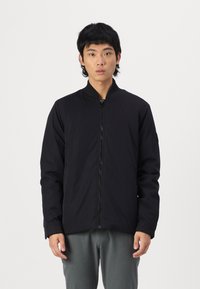 Black bomber jacket with a zip front, ribbed collar, and smooth texture. Features side pockets and a slightly loose fit.