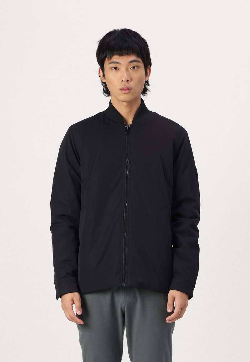 Black bomber jacket with a zip front, ribbed collar, and smooth texture. Features side pockets and a slightly loose fit.