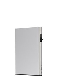 Silver metal cardholder with a slim rectangle design, featuring a black pull tab on one side and a logo embossed on the base.