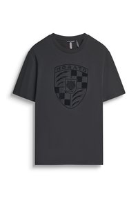 Crna pamučna majica s podignutim, toniranim grbom s logotipom "MORATO" i dizajnom tigra. Kratki rukavi, okrugli izrez i meka tekstura.