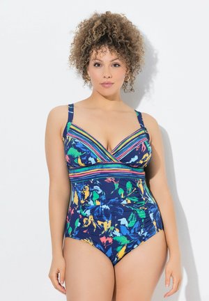 Maillot de bain une pièce avec une base bleu marine, présentant des motifs floraux colorés et un design croisé à rayures multicolores au niveau du décolleté.