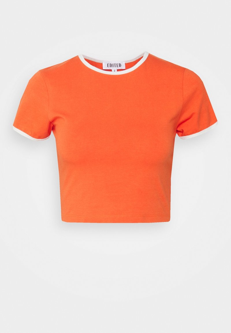 Haut court orange avec un col rond blanc et des ourlets de manches blancs. En coton, avec un design simple et uni sans motifs.