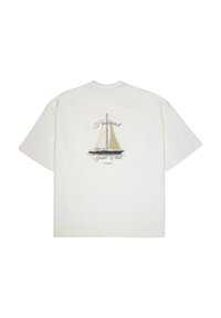 White cotton t-shirt featuring a large sailboat graphic on the back, with "Prohibited Yacht Club" text in a cursive font below.