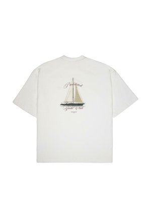 White cotton t-shirt featuring a large sailboat graphic on the back, with "Prohibited Yacht Club" text in a cursive font below.