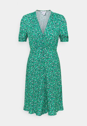 Vihreä kukallinen mekko lyhyillä hihoilla, V-pääntiellä ja napillista etuosaa. Mukana pieniä vaaleanpunaisia ja valkoisia kukkia teksturoituneella kankaalla.