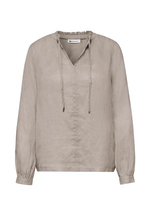 Blusa de manga larga color beige claro con puños fruncidos, cuello con volantes, escote en V y cordones ajustables en el cuello.