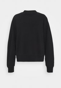 Sudadera negra con cuello redondo, mangas raglán y puños acanalados; fabricada en un material suave y liso con un corte holgado.