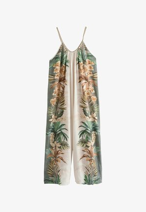 Ujjatlan hosszú overál vékony fonott pántokkal, zöld és barna trópusi virágmintákkal krémszínű anyagon.
