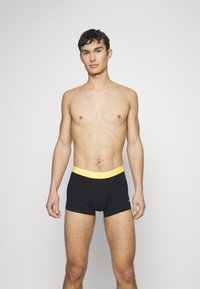 Nike Underwear TRUNK 3 PACK - Boxerbriefs - black/green abyss/laser orange/russet