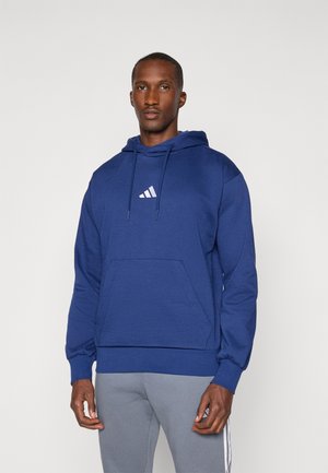 Felpa con cappuccio di colore blu navy con tasca frontale, caratterizzata da un logo triangolare bianco sul petto e polsini a costine. Tessuto morbido.