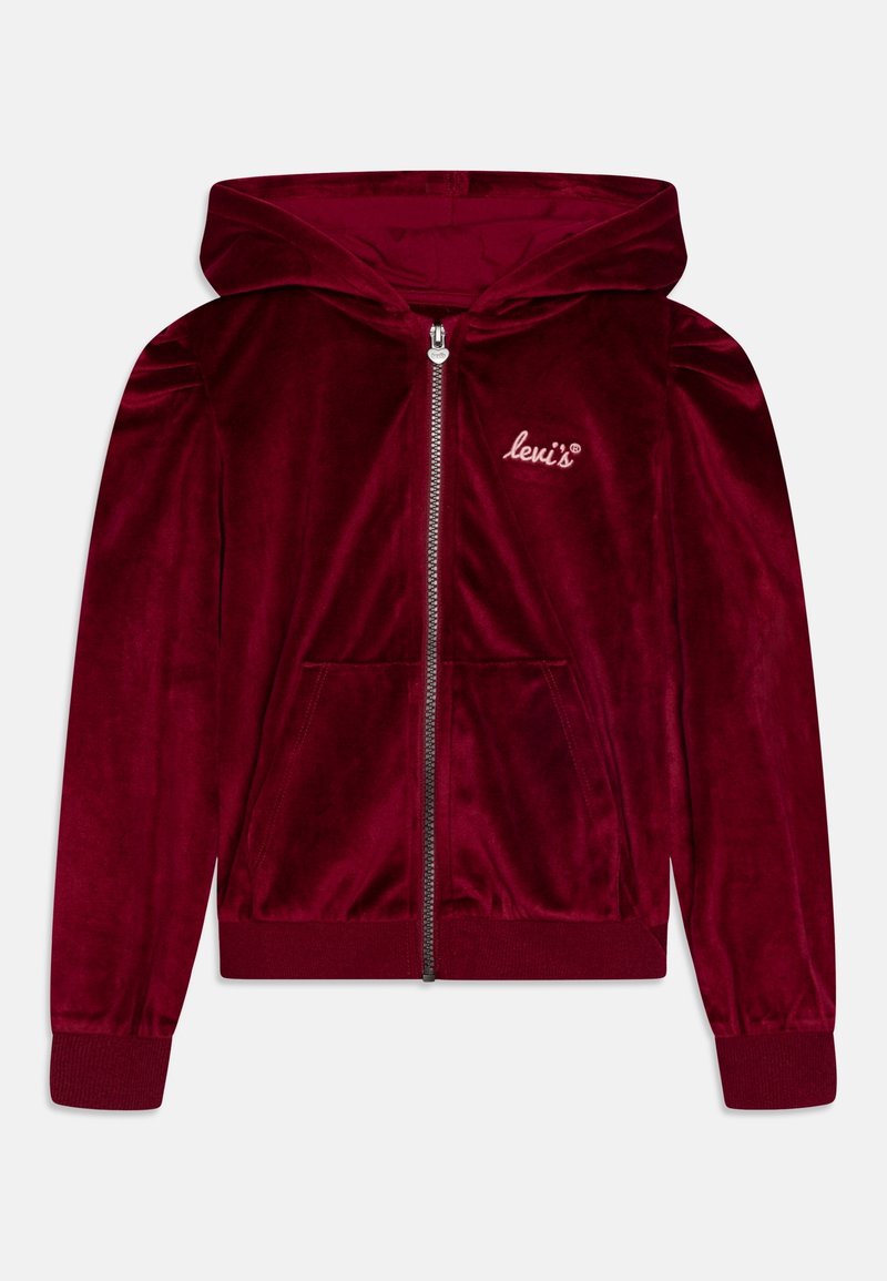 Sweat à capuche zippé en velours bordeaux avec une poche avant, des poignets et un ourlet côtelés. Présente un petit logo brodé sur la poitrine gauche.