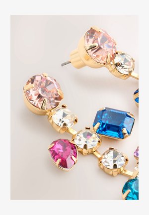 Gold-tone earrings featuring an arrangement of multi-colored gemstones: pink, blue, and clear, with various cut shapes and polished finishes.
