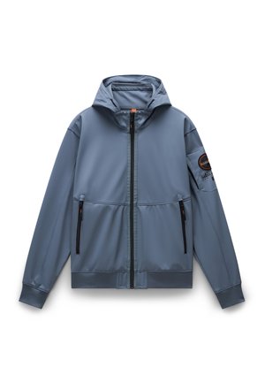 Veste à capuche bleue en tissu lisse et léger. Elle dispose d'une fermeture éclair sur le devant, de deux poches zippées et d'un patch logo sur la manche.