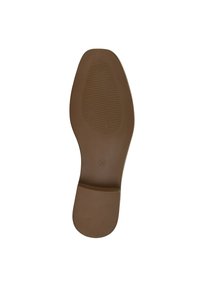 Suola di scarpa in gomma marrone con un motivo di grip testurizzato e una leggera curvature al tallone. Taglia contrassegnata come 36.