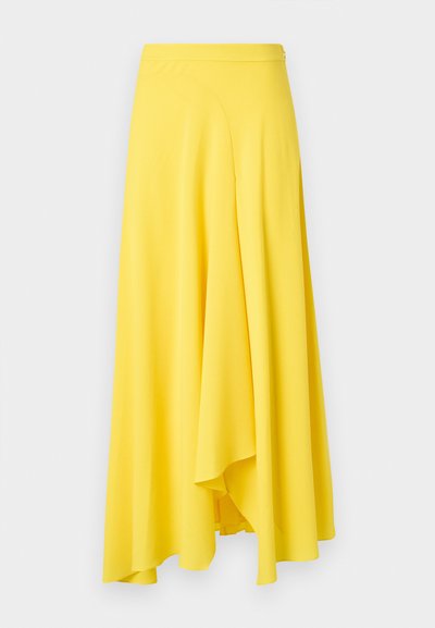 Jupe longue jaune en tissu fluide, avec une ceinture ajustée et un ourlet asymétrique, au toucher doux et lisse.