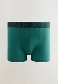 Boxeri din bumbac verde, cu talie neagră pe care se află logo-ul 'NEXT' în verde. Textură netedă și design ajustat, cu lungime până la mijlocul coapsei.