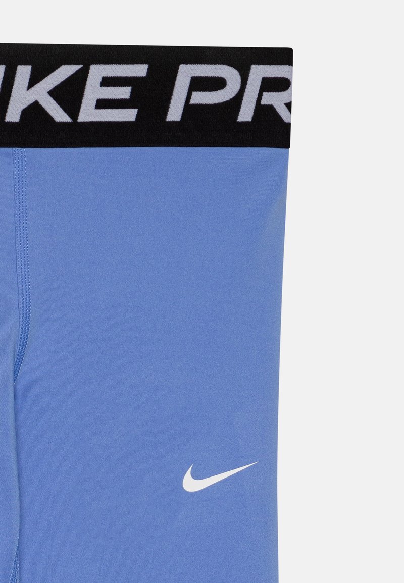 Nike Performance UNISEX Leggings Hosen royal pulse/white