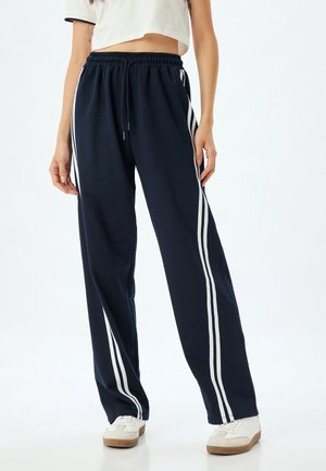 WIDE LEG - Tracksuit bottoms - dark blue