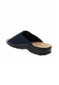 Sandal slide di un blu navy scuro con una parte superiore in rete testurizzata, plantare imbottito beige e suola in gomma nera con un motivo a scanalature ondulate.