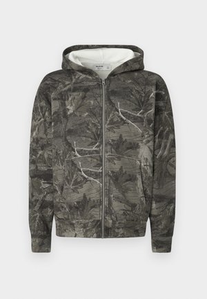 Šedá maskáčová mikina na zips s bielou vnútornou podšívkou. Má dlhé rukávy, predný zips a bočné vrecká. Mäkka, štruktúrovaná tkanina.