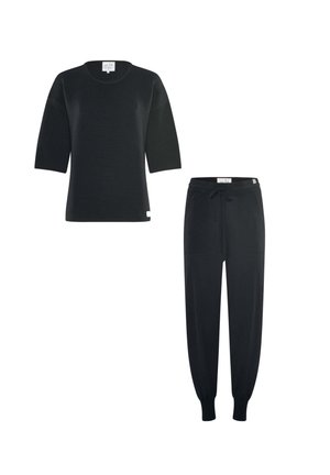 Black ribbed short-sleeve top paired with black drawstring jogger pants with elastic cuffs, displayed on a white background.