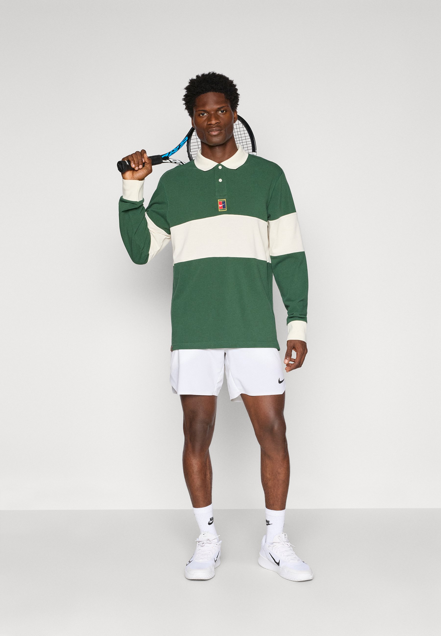 nike court heritage polo