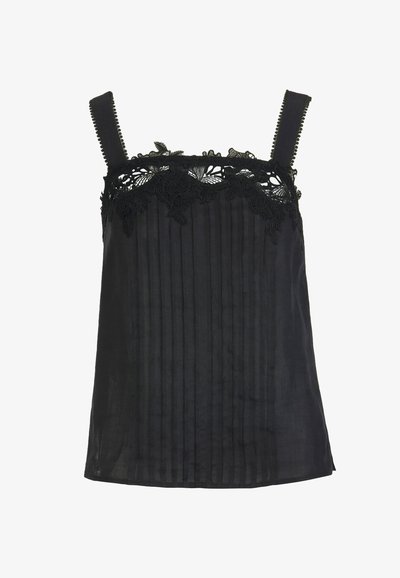 Haut noir sans manches avec devant plissé et bordure en dentelle florale le long du décolleté et larges bretelles.