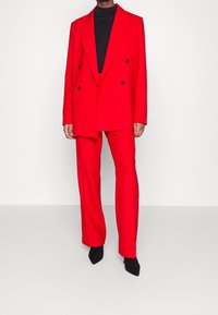 DESIGNERS REMIX Pantalon classique - red