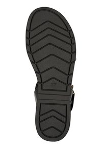 Schwarze Sandalensohle mit einer strukturierten Gumm OBERFLÄCHE, die Zickzack-GriPP Muster aufweist und einer Größenkennzeichnung von 37.