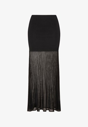 Black skirt with a fitted top and a pleated, sheer lower section. Smooth texture above transitions to a flowing, textured appearance below.