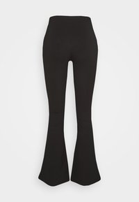 Gina Tricot Petite FLARE JERSEY TROUSERS - Παντελόνι - black
