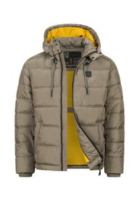 Polstret jakke i beige med gul innside. Har hette, glidelås og snorlukking. Inkluderer sidelommer og logodetalj.