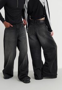 YOURTURN by Zalando UNISEX - Platūs džinsai - black denim