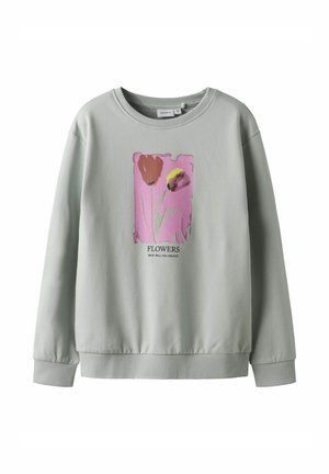 Sweatshirt gris clair en coton, avec un motif floral en rose, rouge et jaune. Col et poignets côtelés, coupe décontractée.