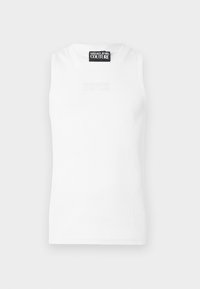 Haut blanc sans manches côtelé avec étiquette Versace Jeans Couture à l'encolure et logo embossé subtil sur la poitrine.