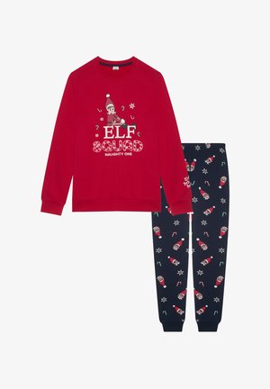 Rød langærmet bluse med "Elf Squad" grafik, parret med marineblå bukser dekoreret med nisser, sukkerstænger og snefnug.