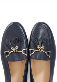 Navy leather loafers with gold hardware and tassel accents. Rounded toe and smooth texture. Flat sole, designed for comfort.